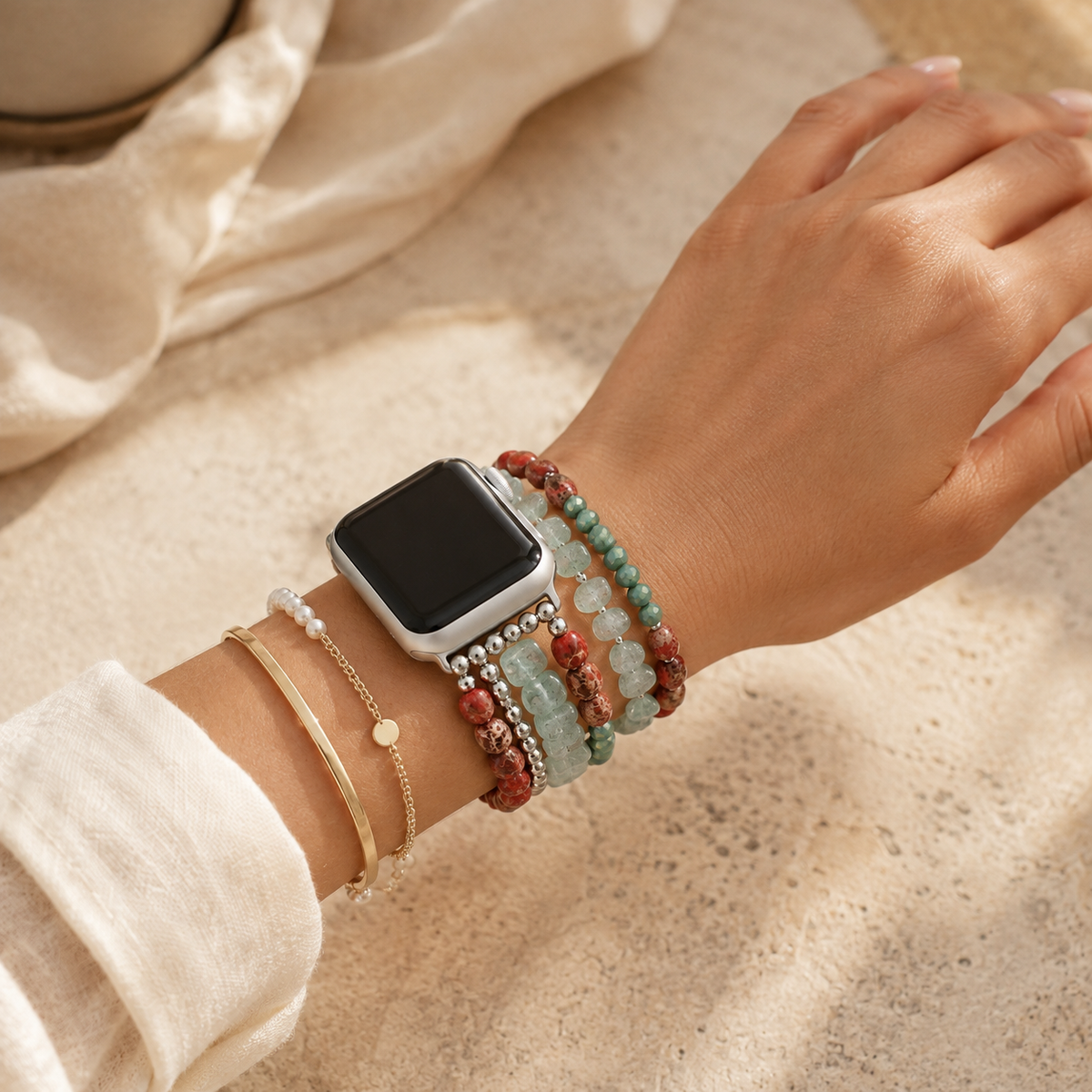 Bohemian style beaded Apple Watch strap worn on a woman's wrist
