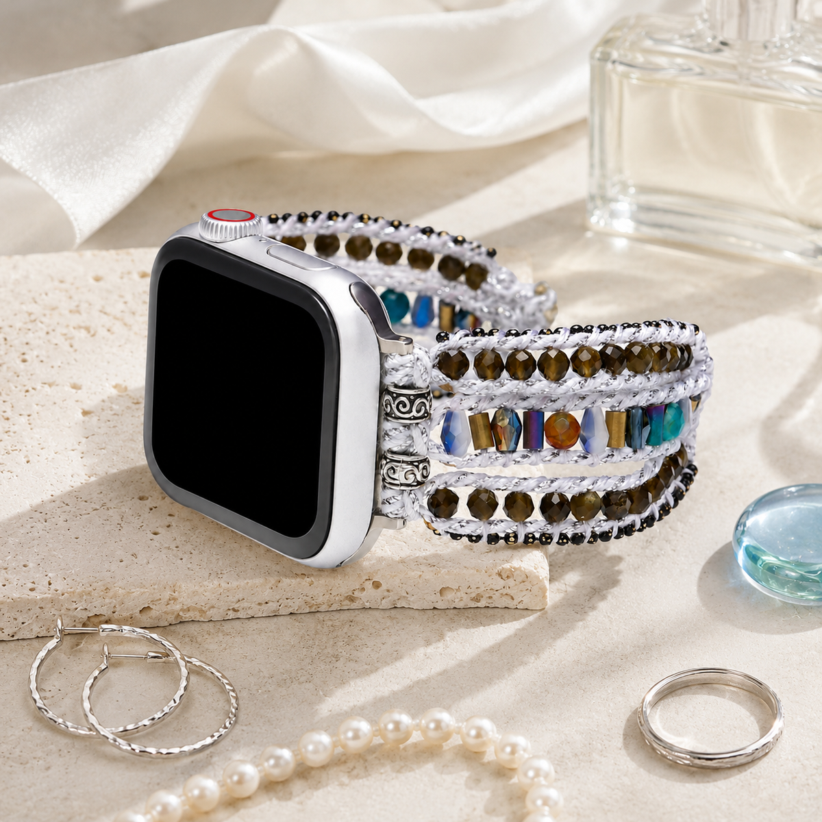Ivory tiger eye wrap Apple Watch band styled with pearls and silver jewelry