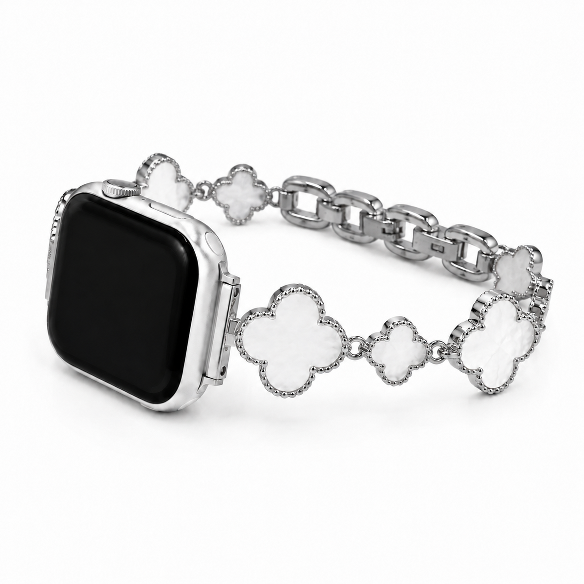 Close up detail of shell four-leaf clover charms on Apple Watch bracelet