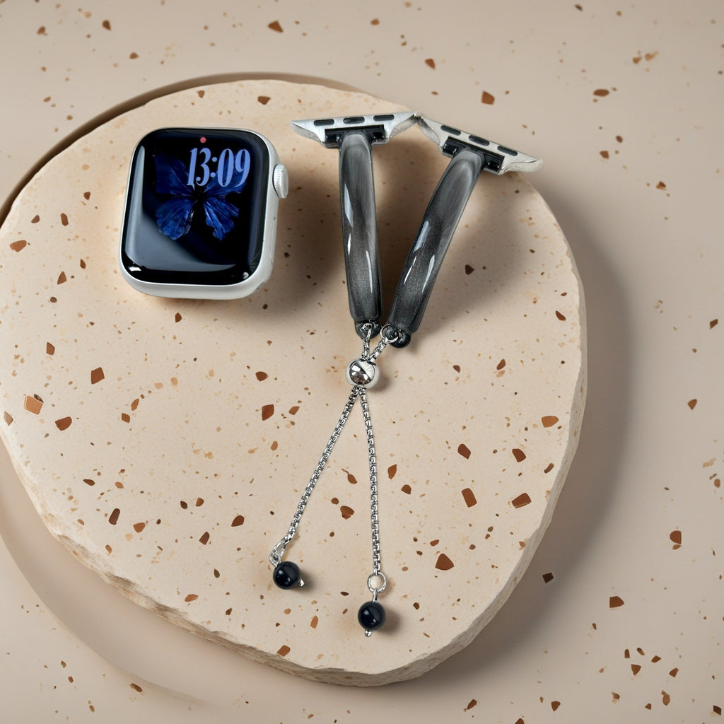 Black cat eye bracelet band for Apple Watch with elegant bead tassel