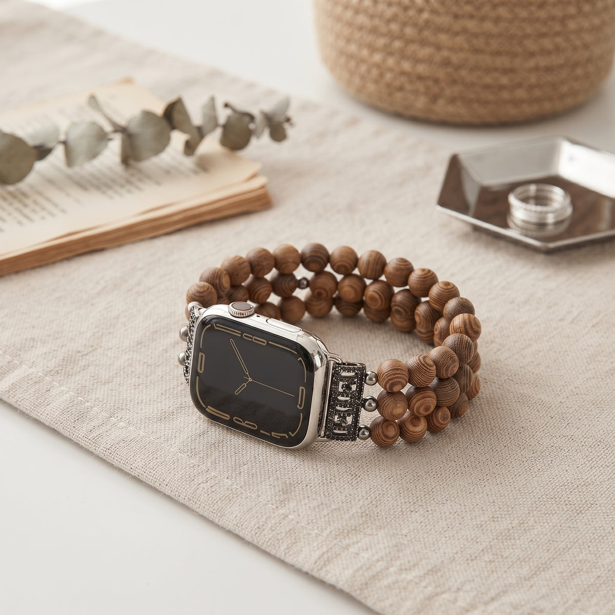 Natural Wood Beaded Apple Watch band styled as a jewelry accessory