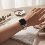 Stainless Steel Link Jewelry Apple Watch band worn on the wrist