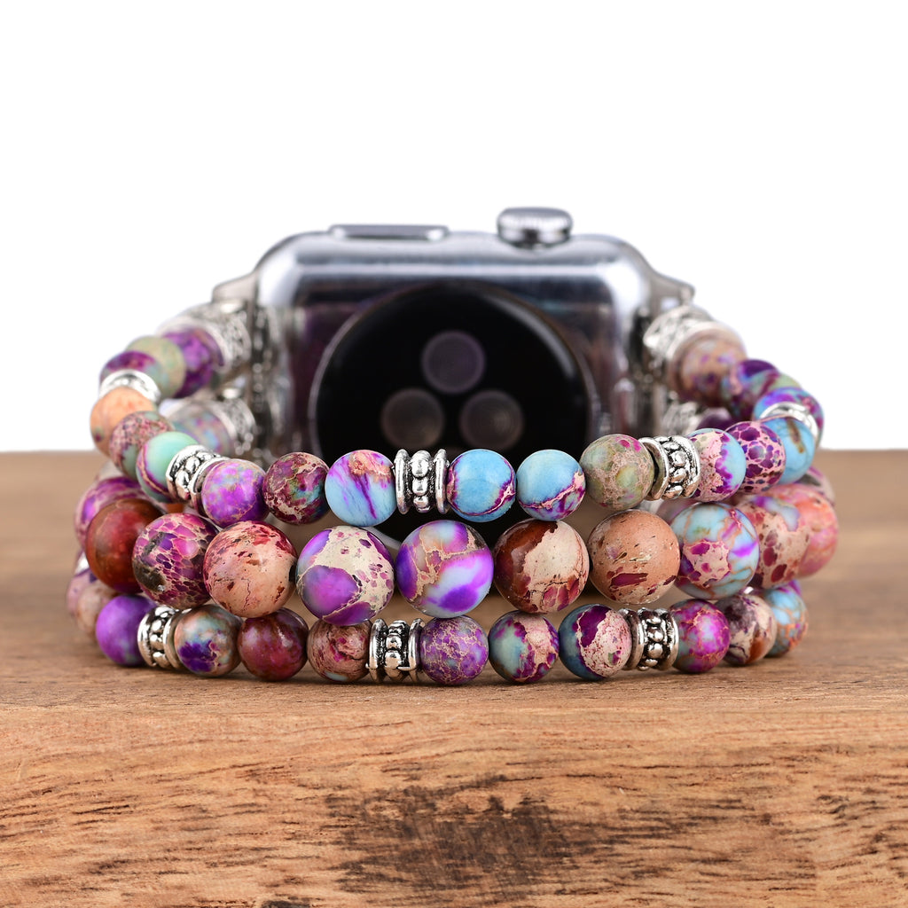 Turquoise Triple-Strand Apple Watch band worn on the wrist
