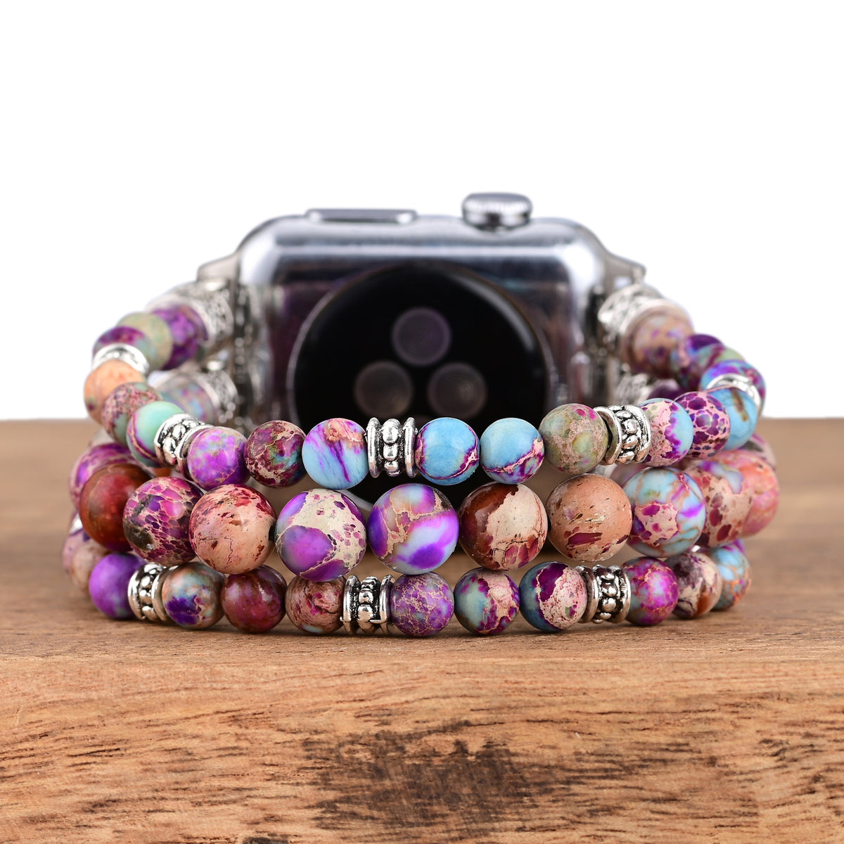 Turquoise Triple-Strand Apple Watch band worn on the wrist